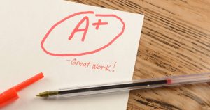 a plus written on paper